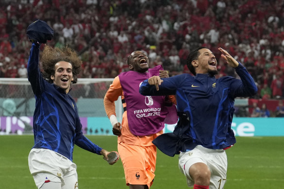 French players celebrate after the World Cup semifinal between France and Morocco at Al Bayt Stadium in Al Khor, Qatar, on December 14.