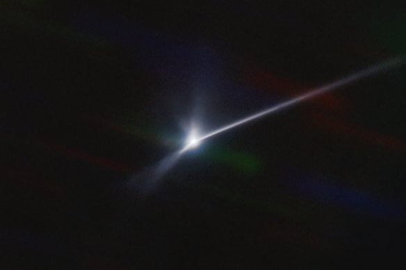 A plume of dust and debris blasted from the surface of the asteroid Dimorphos by NASA’s DART spacecraft. The expanding, comet-like tail is more than 10,000 kilometres long.