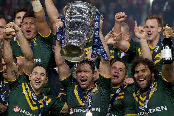 The Kangaroos with their trophy after winning the 2013 Rugby League World Cup final against New Zealand.