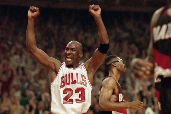 Michael Jordan celebrates the Bulls' win over the Portland Trail Blazers in the NBA Finals in Chicago in June 1992.