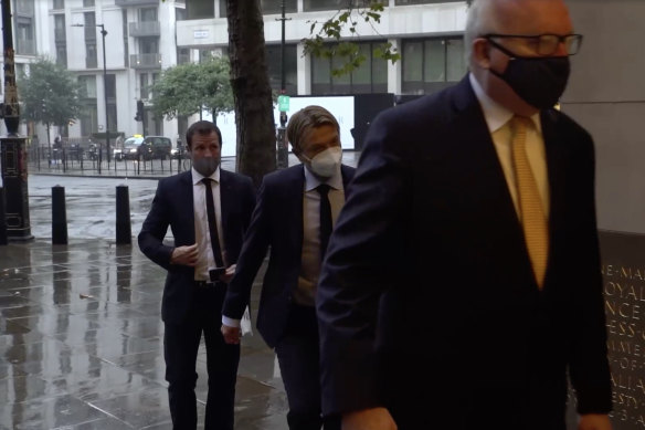 Lucas Neill (left), trailing new Matildas coach Tony Gustavsson and Australia's High Commissioner to the UK, George Brandis.