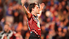 Luke Metcalf celebrates a try.