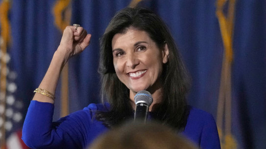 Republican presidential candidate Nikki Haley pumps her fist during a campaign gathering on May 24 in Bedford.