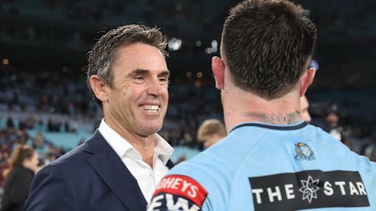 Brad Fittler celebrates victory with Bradman Best.