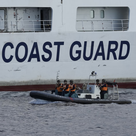 The Chinese Coast Guard and maritime militia keep watch around islands and other land features that Beijing lays claim to in the South China Sea.