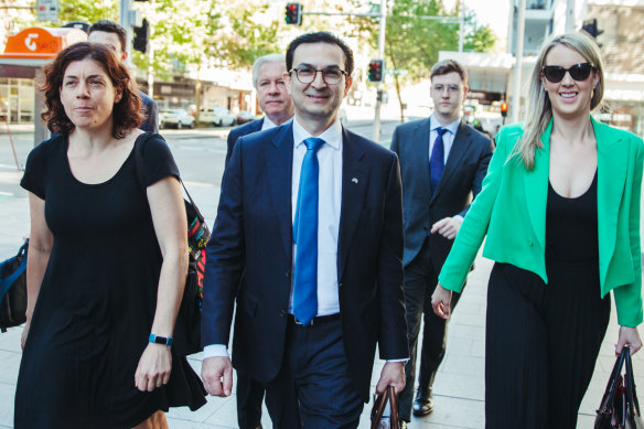 Barrister Sue Chrysanthou SC, surgeon Munjed Al Muderis with partner Claudia Roberts in September 2023.