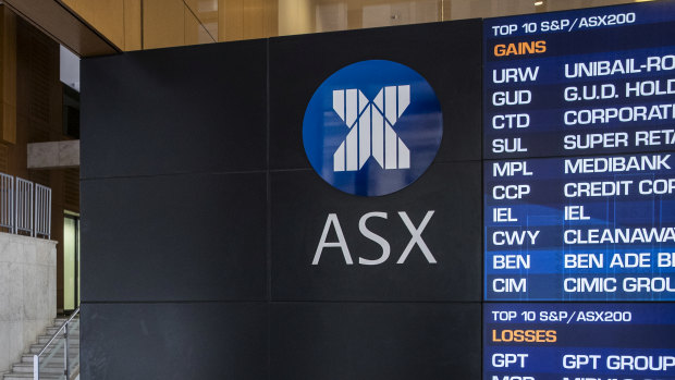 ASX rises despite slide in mining and energy stocks