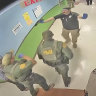 Surveillance video shows authorities responding to the school shooting.