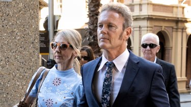 Craig McLachan arrives at court on Monday with his partner Vanessa Scammell.