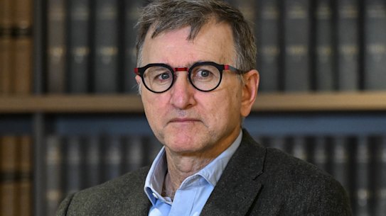 Administrator Marking Irving, centre, has been forced to hire private security as he faces pressure, and danger, in his task to clean-up the CFMEU.