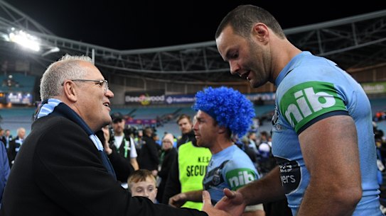 Prime Minister Scott Morrison congratulates Boyd Cordner after NSW secured back-to-back Origin triumphs.
