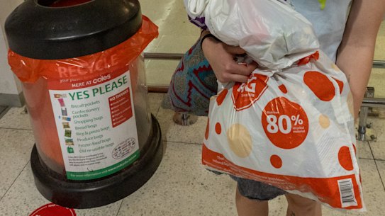 Student Lucinda Moje, with plastic she had intended to donate to REDcycle.