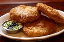 Potato cakes with creme fraiche and lumpfish caviar.