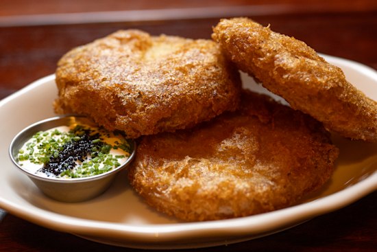 Potato cakes with creme fraiche and lumpfish caviar.