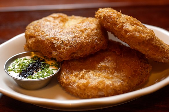 Potato cakes with creme fraiche and lumpfish caviar.