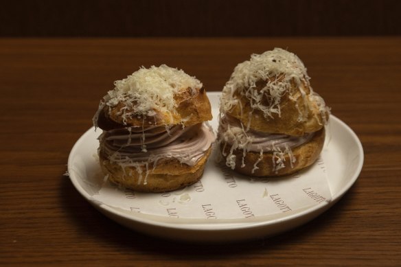 Mortadella bigne (choux pastry filled with mortadella mousse and showered in comte).
