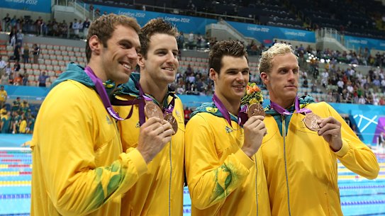 Matt Targett, James Magnussen, 
Christian Sprenger and Hayden Stoeckel pose with their bronze medals in London eight years ago.