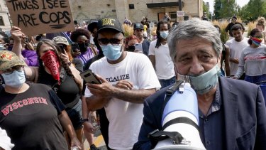 Kenosha Mayor John Antaramian tries to speak to protesters in Kenosha, Wisconsin.