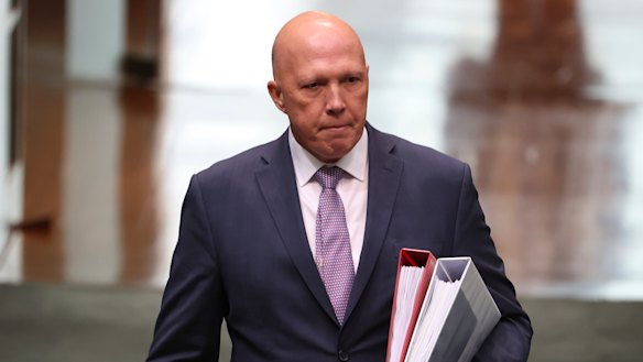 Home Affairs Minister Peter Dutton approved funding for two projects in a marginal seat before the funding guidelines were available.