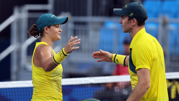 Ash Barty and John Peers did not have to lift a finger to win their bronze medal mixed doubles match. 