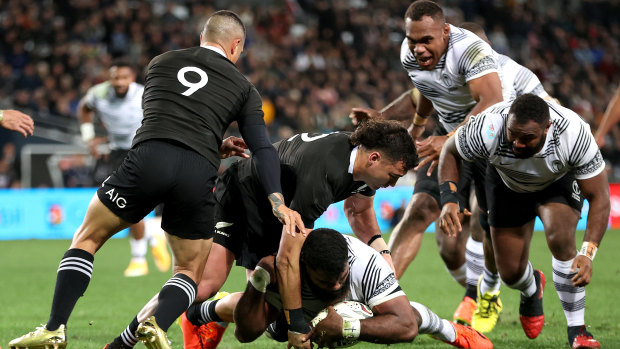 Albert Tuisue of Fiji dives over to score a try against the All Blacks at Forsyth Barr Stadium in Dunedin on Saturday. The hosts won 57-23 but Fiji dominated the breakdowns and scored three tries against their  much more fancied opponents.