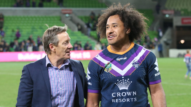 Hair apparent: Felise Kaufusi with Craig Bellamy after beating Souths in the first week of the finals.