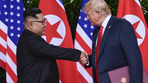 North Korea leader Kim Jong Un and US President Donald Trump shake hands at the conclusion of their meetings.