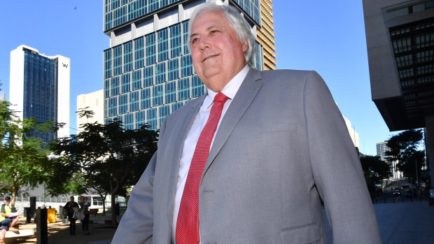 Clive Palmer leaves the Supreme Court in Brisbane on Monday.