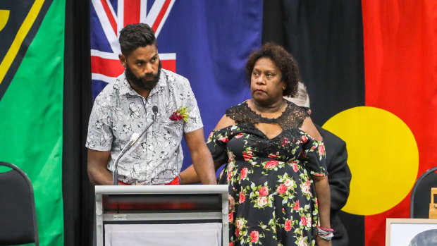 Bonita Mabo's grandson Kaleb Cohen, reads his 'Letter to Nornie', a letter he wrote to Bonita just before she passed away and she asked him to read at her service. With him is Gail Mabo, daughter of Bonita.