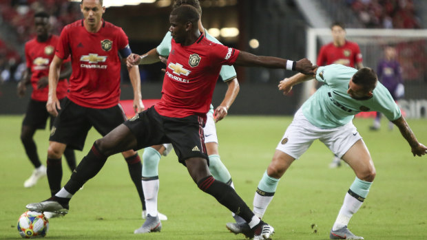 Still a Red Devil: Manchester United's Paul Pogba in action against Inter Milan in Singapore.
