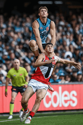 Port Adelaide’s Mitch Geogiades flies high for a screamer against St Kilda.