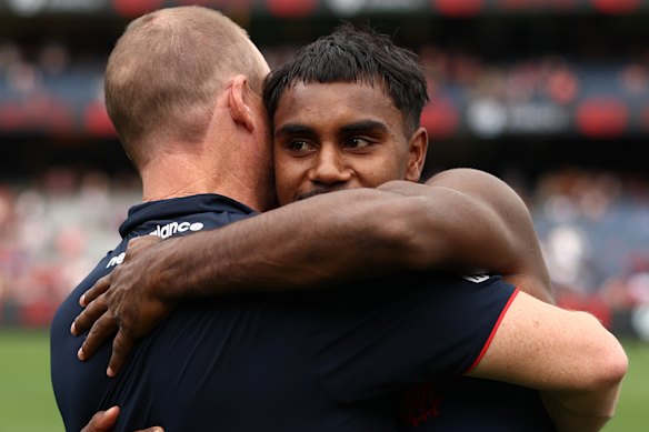 Simon Goodwin and Kysaiah Pickett embrace after the Demons’ drought-breaking win against Fremantle in round six.