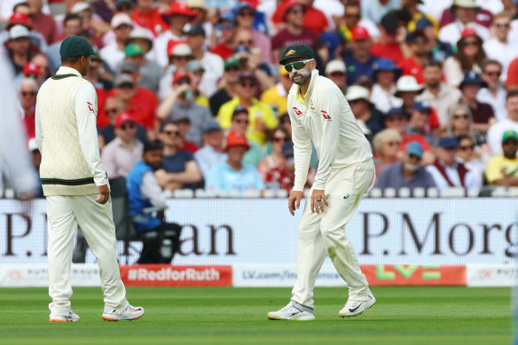 Nathan Lyon reacts after sustaining an injury while fielding on day two of the Lord’s Test.