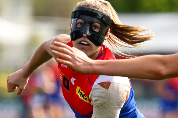 Demon Olivia Purcell played in a mask because of a facial injury she suffered pre-season.