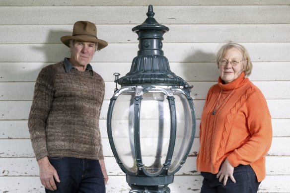 Bill and Jillian Ronald with the street lamp they salvaged after it was taken down, and which led to Bill’s ejection from a council meeting.