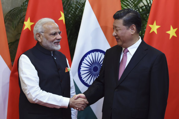 Indian Prime Minister Narendra Modi and Chinese President Xi Jinping in Wuhan in 2018, before recent hostilities began.