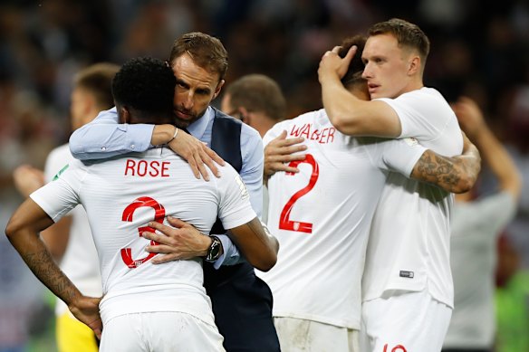 Former England men’s soccer team manager Gareth Southgate comforts players after a 2018 World Cup semifinal loss. “Success is much more than the final score,” he says.