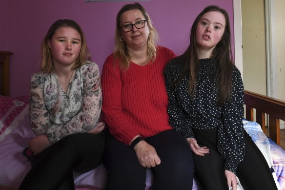 Melanie Kent with her daughters Bianca and Isabella, both of whom attend specialist schools in Frankston. 