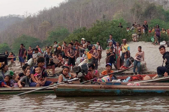 People on the banks of the Salween river crossed into Thailand but were turned back.