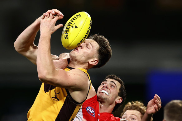 Hawthorn’s Jacob Koschitzke attempts a mark against the Swans on Friday night.