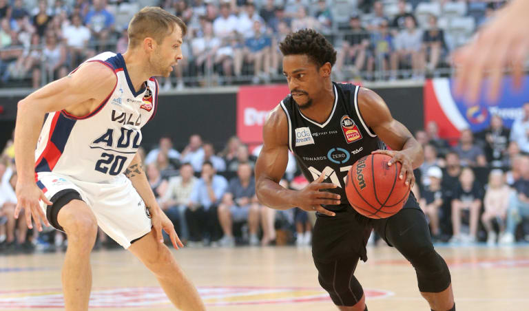 Casper Ware of Melbourne United (right) under pressure from the Adelaide 36ers' Nathan Sobey at Melbourne Arena on Wednesday night.