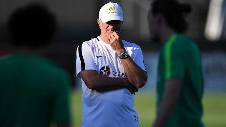 Foes turned friends: Graham Arnold's friendship with former A-League adversary Kenny Lowe has seen them reunite with the Socceroos.