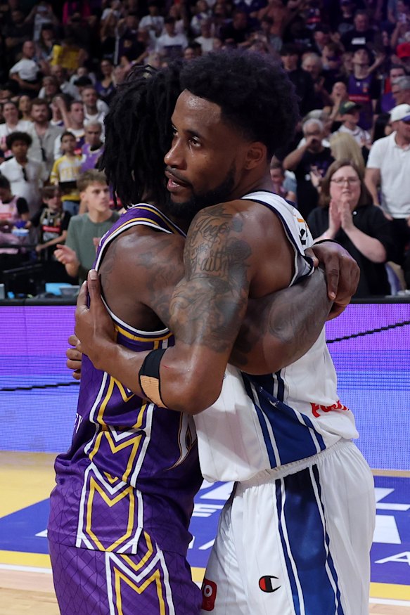 Kendric Davis and Bryce Cotton hug it out at the end.