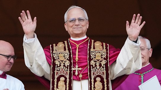 Cardinal Robert Prevost appears on the central loggia of St. Peter’s Basilica after being chosen the 267th pontiff of the Roman Catholic Church, choosing the name of Pope Leo XIV, at the Vatican, Thursday, May 8, 2025. (AP Photo/Alessandra Tarantino)