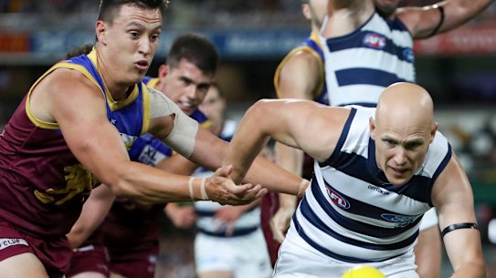 Gary Ablett pounces on the ball.