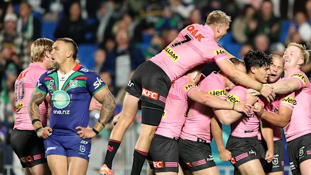 The Panthers celebrate a Blaize Talagi try.