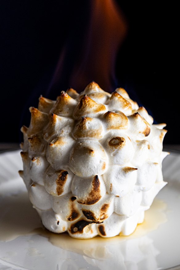 Bombe Alaska, flabeed at the table, is “a spiky ball of joy”.