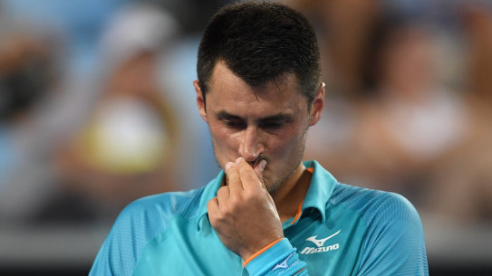 No joy: Bernard Tomic made an early exit from the Australian Open last night.