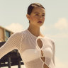Venroy dress, $200. Sea Level Australia “Spinnaker” bandeau, $100, and bikini pants, $60. Basil Bangs umbrellas, $199 each, and deck chairs, $389 each. Oliver James inflatable ring, $1200.