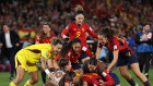  Spain players celebrate after the team’s victory in the FIFA Women’s World Cup.